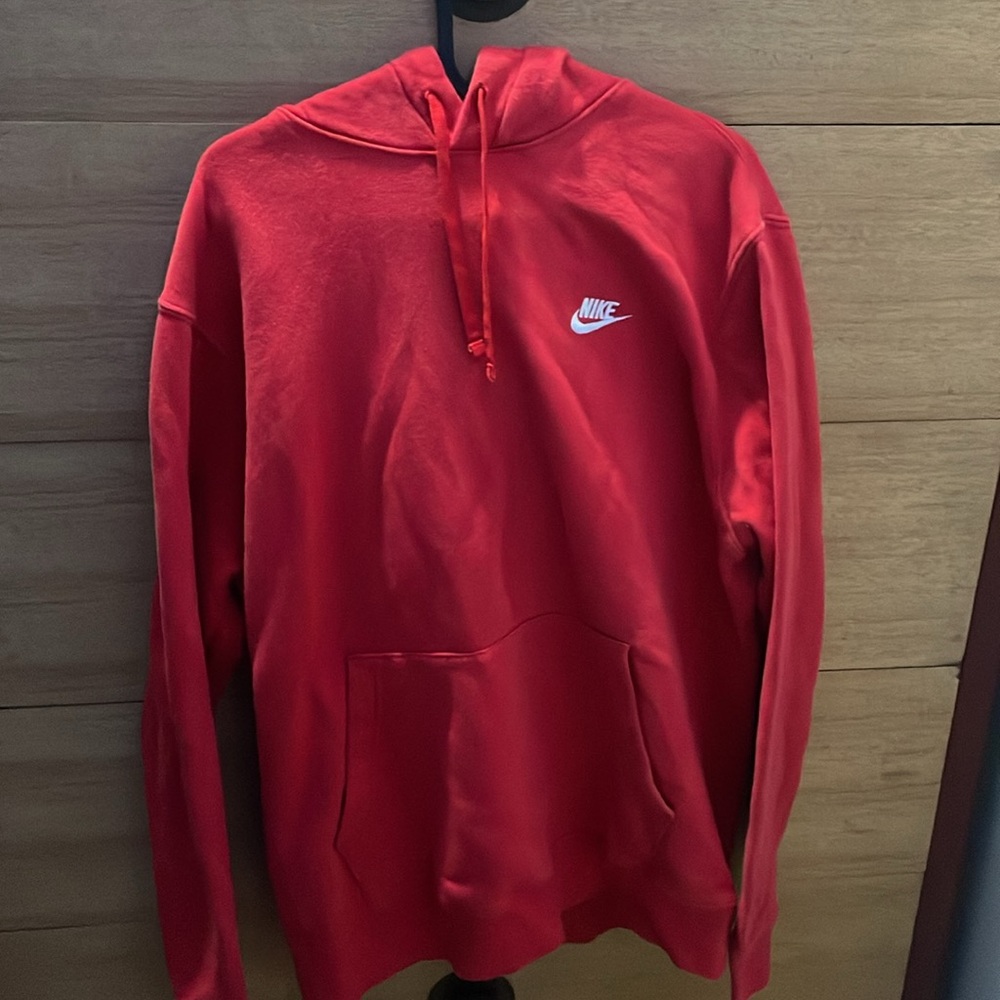 large red Nike hoodie